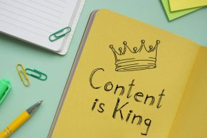 A book that writes "Content is King"