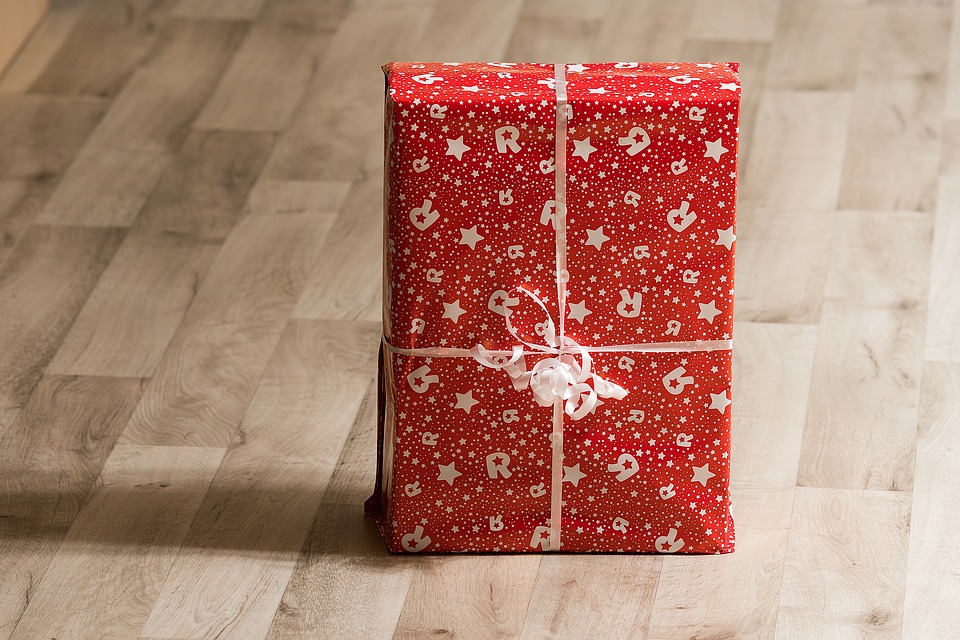 Beautifully wrapped gift in red wrapping paper